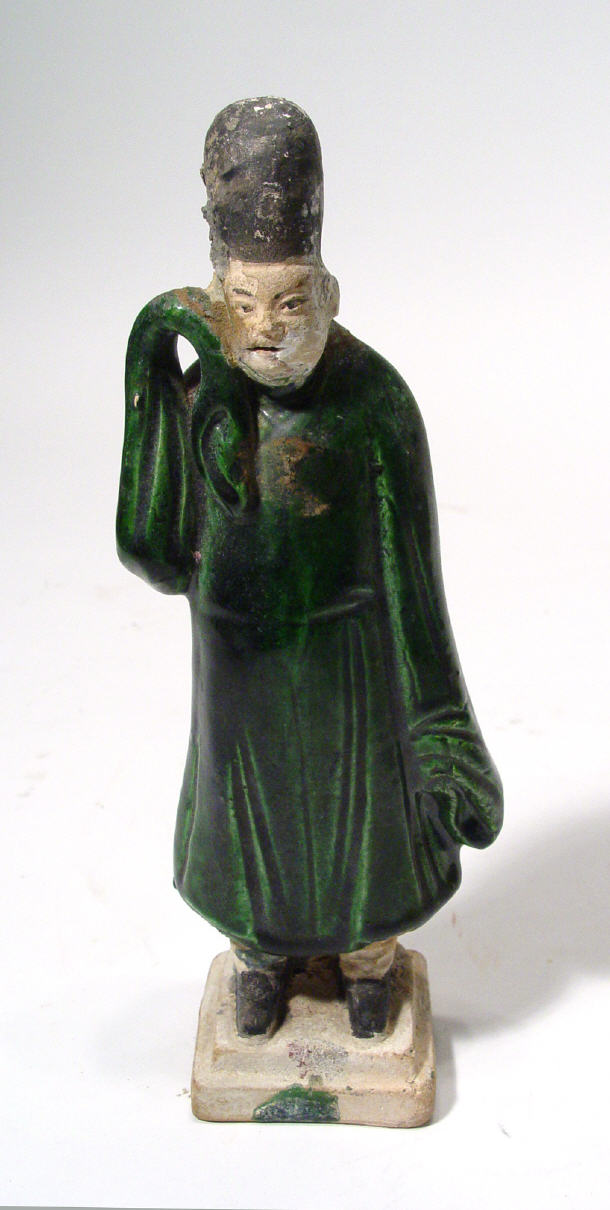 Appraisal: th Century style Chinese pottery figure in green glazed robes