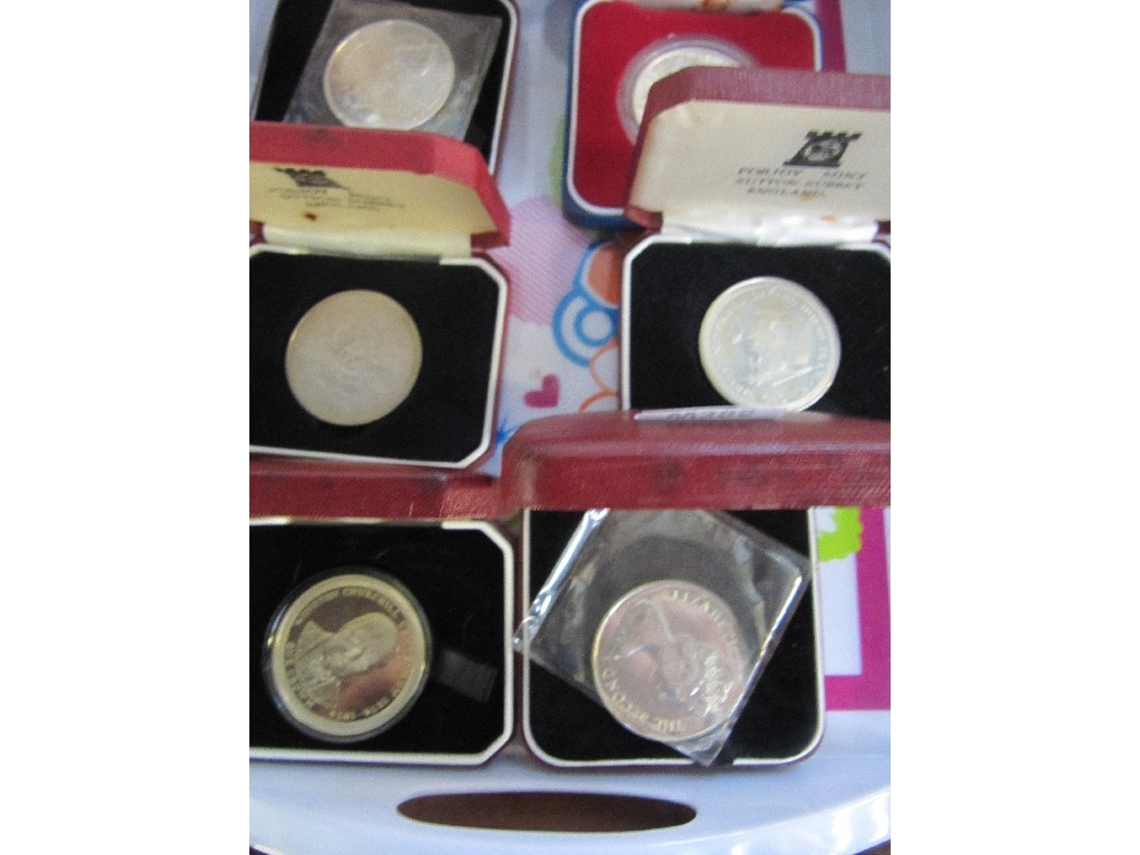 Appraisal: Lot comprising six cased coins and a box of loose