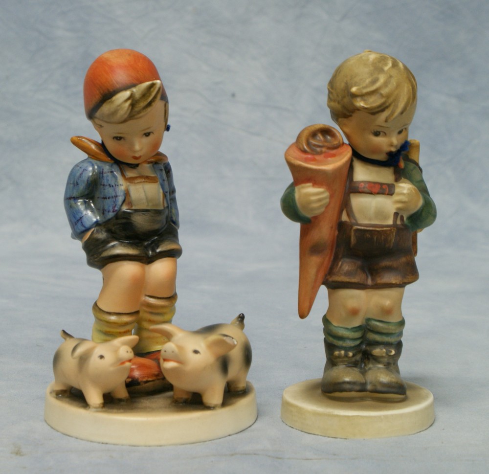 Appraisal: Hummel figurines Farm Boy Hum small chip on base Little