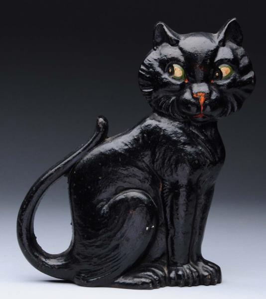 Appraisal: Cast Iron Sitting Cat Doorstop Marked Copyright A M Greenblatt