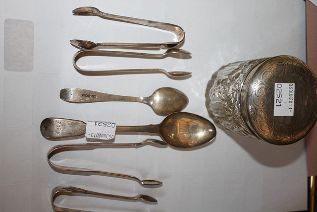 Appraisal: A SILVER TOP JAR and a collection of silver tongs