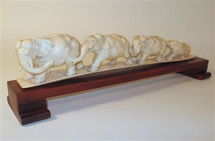 Appraisal: Chinese elephant ivory elephant groupingSingle section carving of four linked