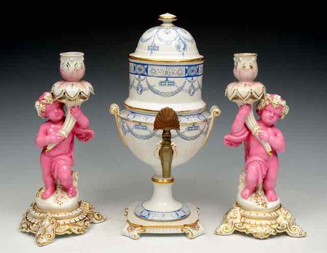 Appraisal: A PAIR OF MINTON CANDLESTICKS in the form of pink