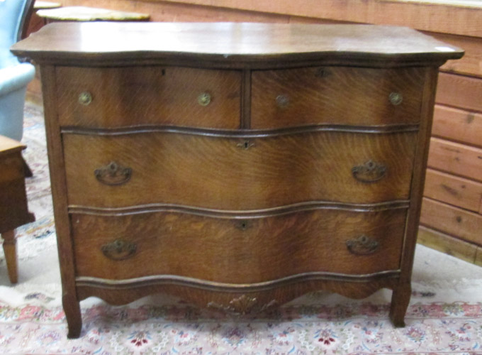 Appraisal: OAK SERPENTINE-FRONT DRESSER American c having two small or two