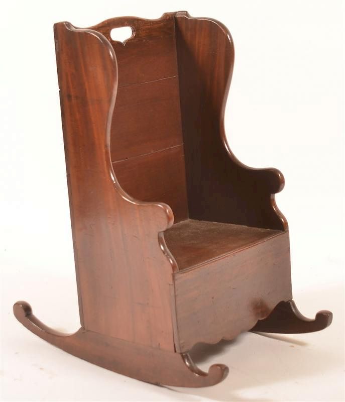 Appraisal: Mahogany Settle Form Child's Rocking Chair Early th Century Mahogany