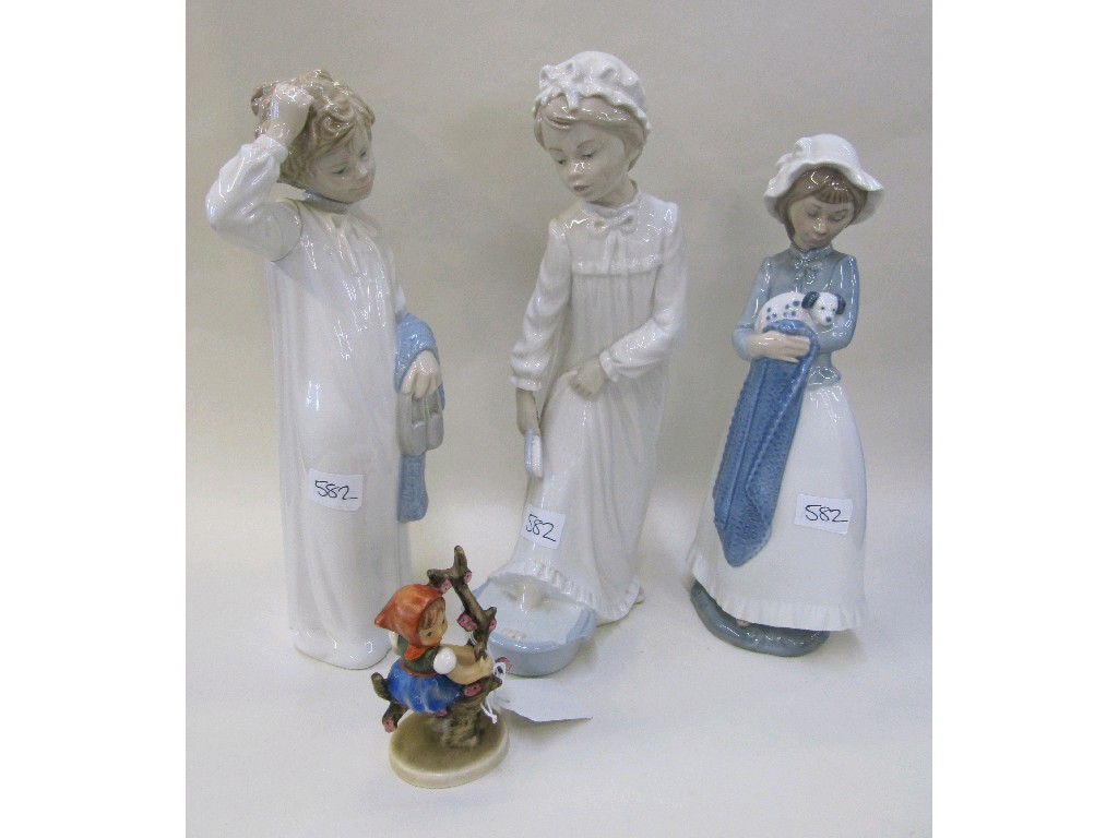 Appraisal: Three Nao figures and a Hummel figure 'Apple Tree Girl'