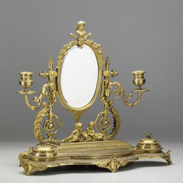 Appraisal: VICTORIAN PARCEL-GILT DESK SET Complete with inkwells mirror and candleholders