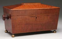 Appraisal: FINE REGENCY MAHOGANY TEA CADDY Sarcophagus shape with wonderful curly