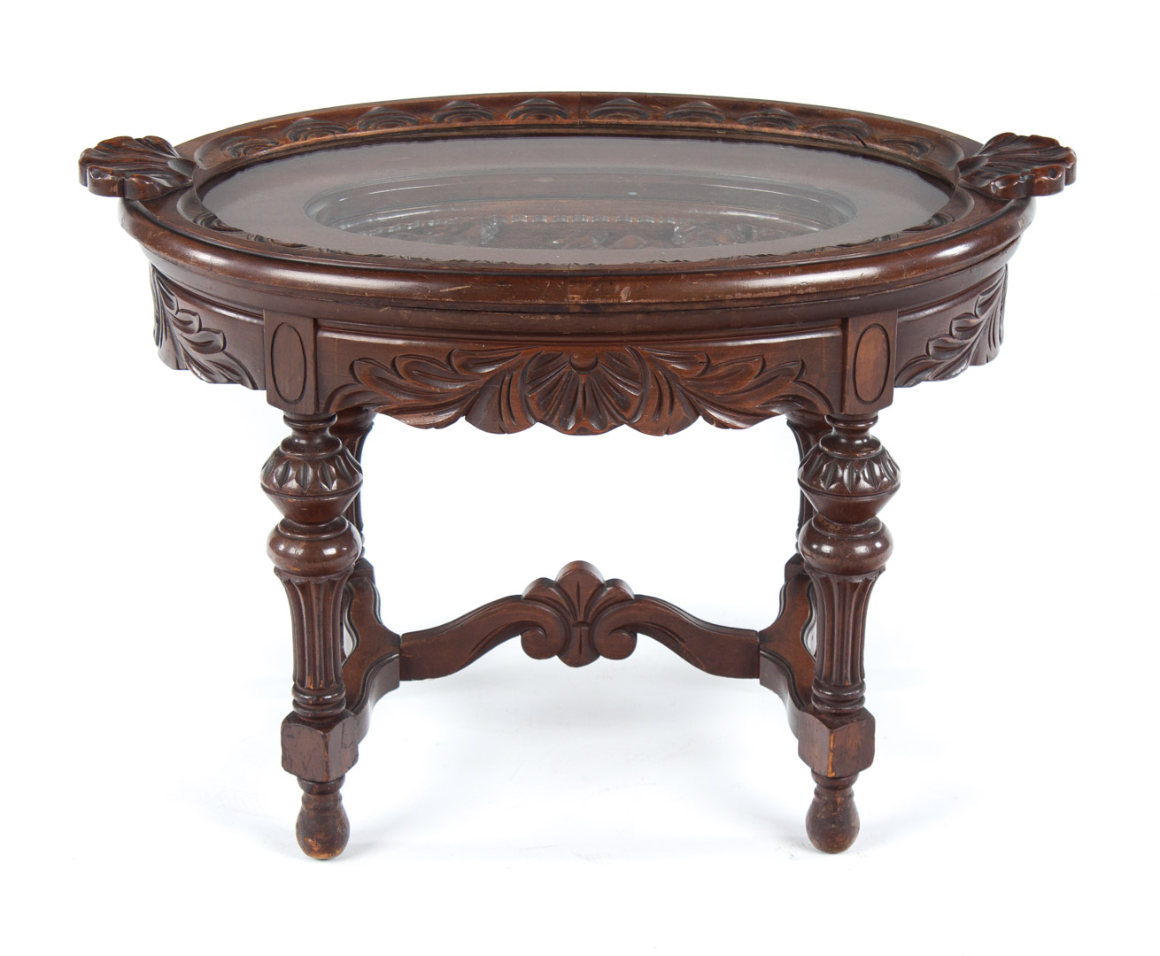 Appraisal: Carved walnut glass top coffee table removable oval glass tray