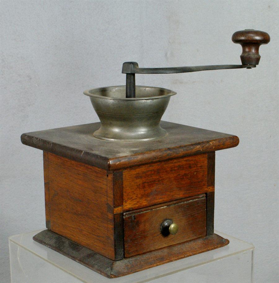 Appraisal: Dovetailed walnut pewter and cast iron coffee grinder original drawer