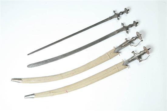 Appraisal: FOUR SWORDS India late th-early th century Talwar-type swords two