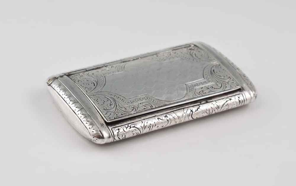 Appraisal: AUSTRIAN SILVER SNUFF BOX Engraved foliate scroll and geometric designs