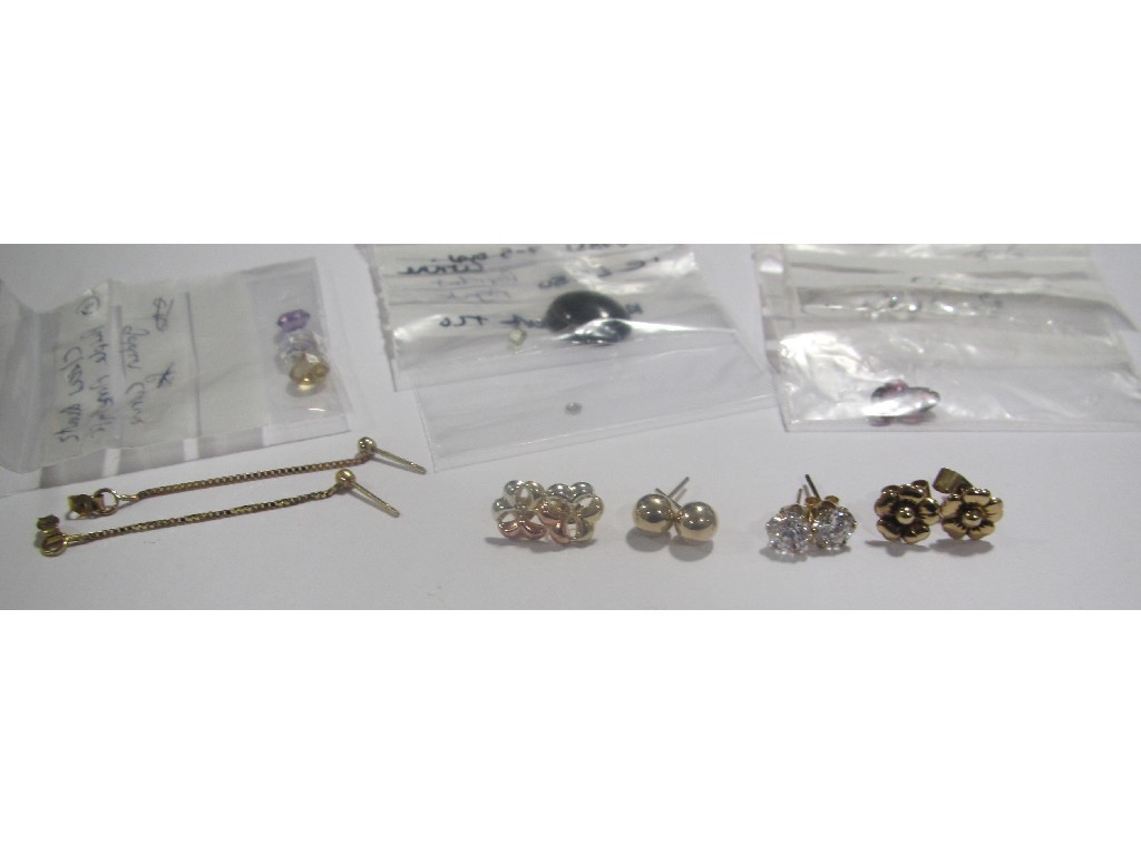 Appraisal: Lot comprising five pairs of gold earrings and some loose