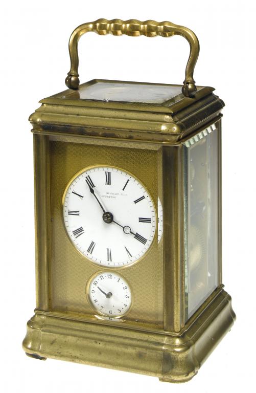 Appraisal: A FRENCH GILT BRASS CARRIAGE CLOCK the enamelled dial with