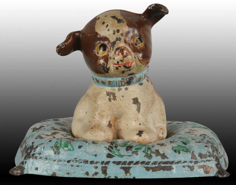 Appraisal: Fido on Pillow Cast Iron Still Bank Description Made by