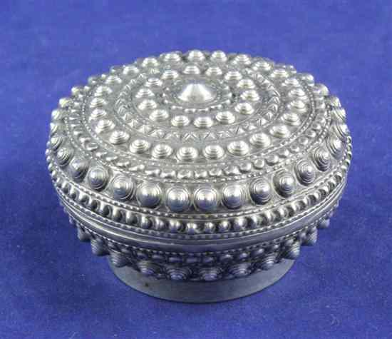 Appraisal: A Chinese silver circular box and cover embossed with studded