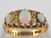 Appraisal: An carat gold opal and diamond ring hallmarked Birmingham largest