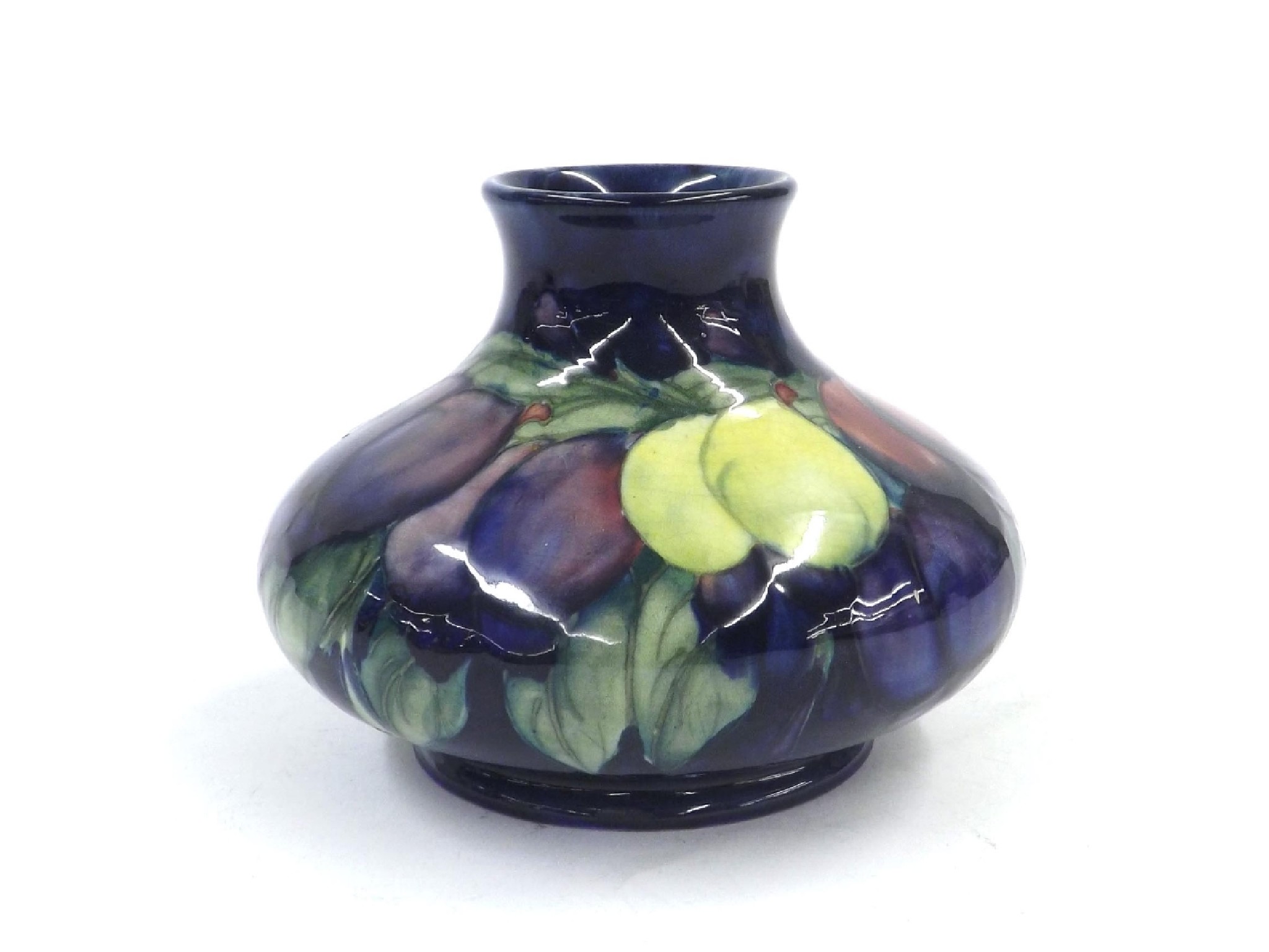 Appraisal: Moorcroft 'Wisteria' design squat ovoid vase decorated upon a blue