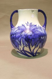 Appraisal: A large Moorcroft twin-handled vase in blue and white decorated