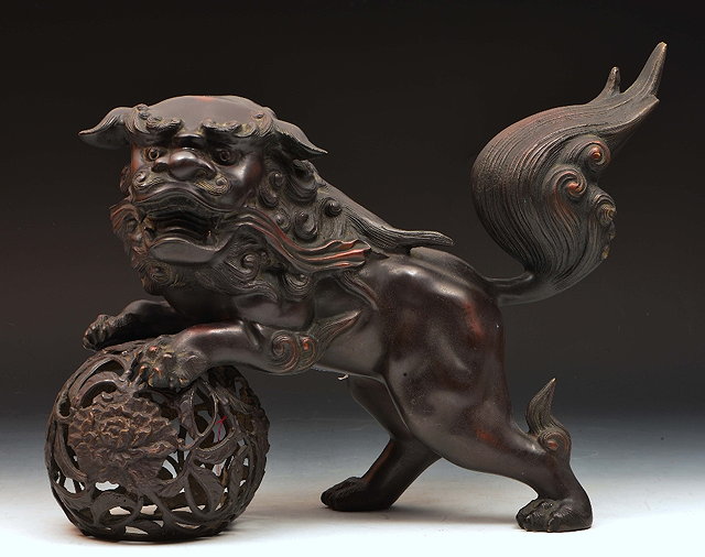 Appraisal: Chinese bronze 'Buddhist lion' incense burnerand cover th Century style