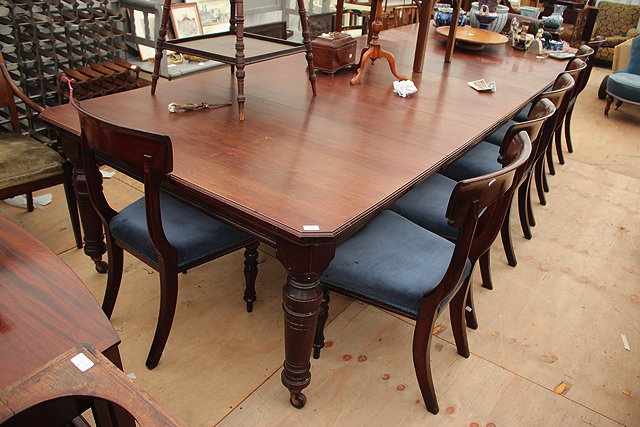 Appraisal: A VICTORIAN MAHOGANY EXTENDING DINING TABLE with turned tapering legs