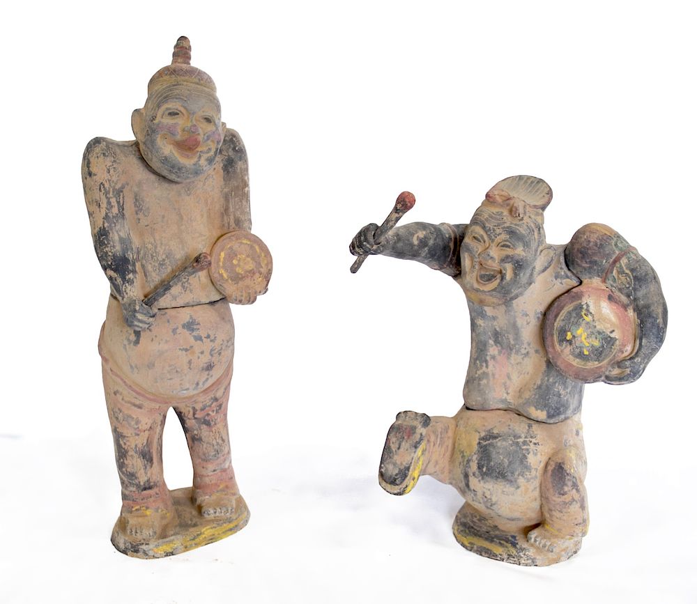 Appraisal: A Pair of Terra Cotta and Polychrome Drummers Chinese possibly