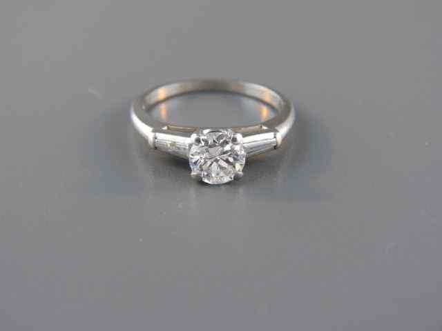 Appraisal: Diamond Platinum Ring Carat centerstone with baguettes on each side