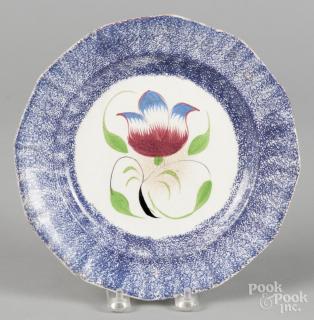 Appraisal: Blue spatter plate th c with tulip decoration '' dia