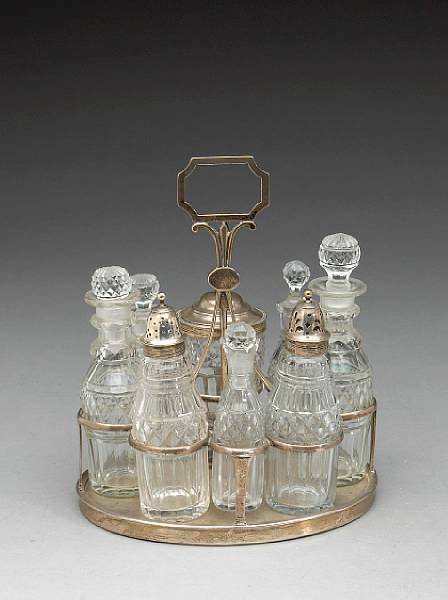 Appraisal: A George III silver and wood cruet stand with original