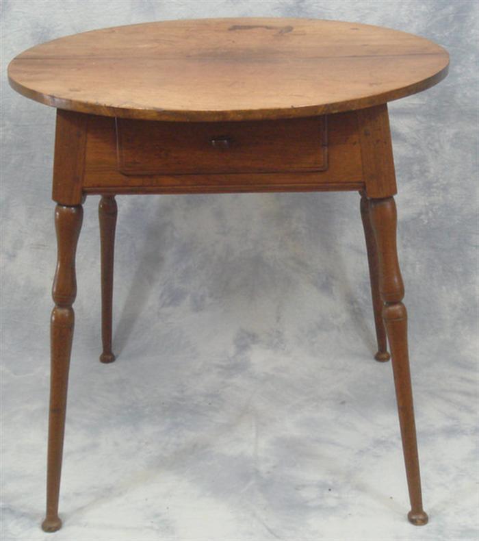 Appraisal: Pennsylvania walnut splay leg table with round top and single