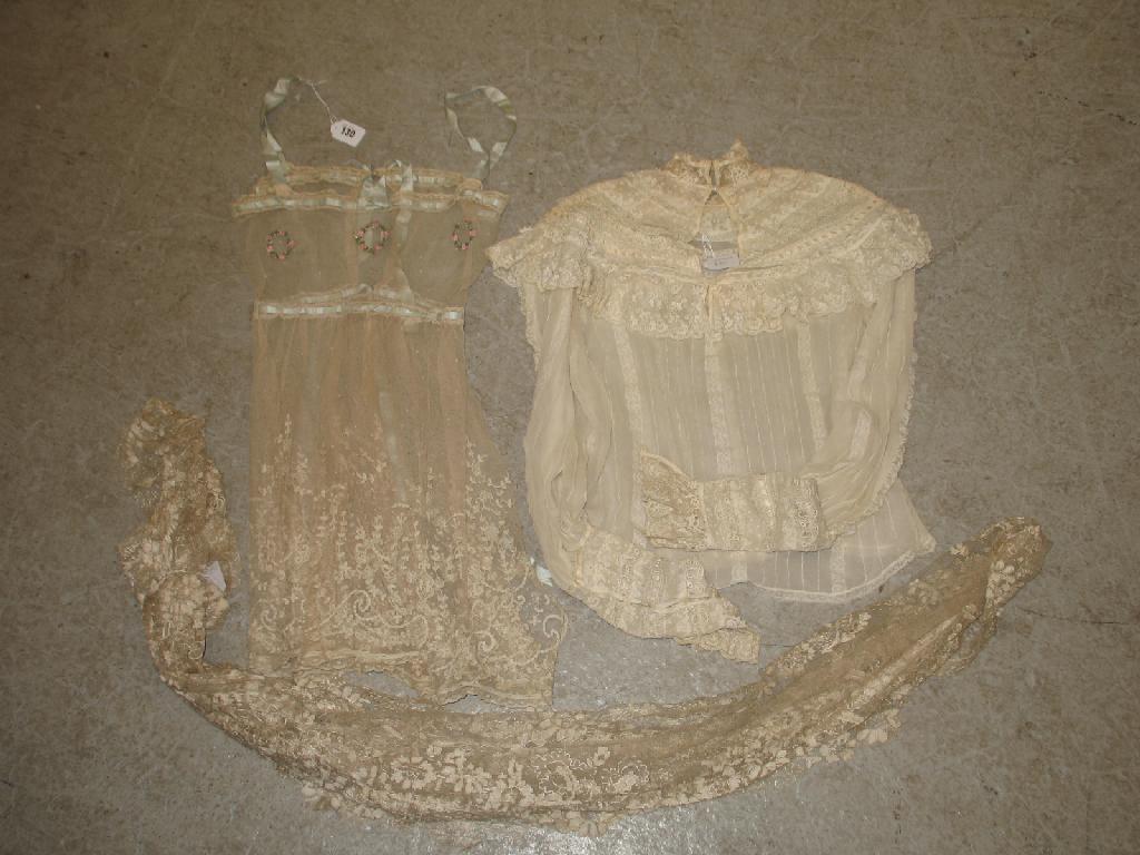 Appraisal: A Kate Greenaway style fine cream lace petticoat the waistline