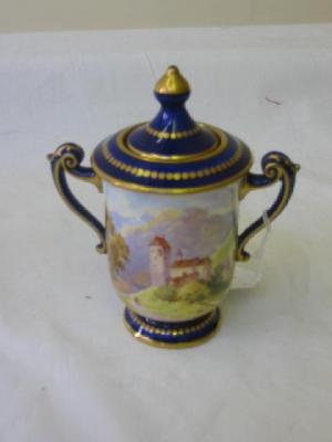 Appraisal: A ROYAL DOULTON PORCELAIN LIDDED VASE with pointed lid scroll