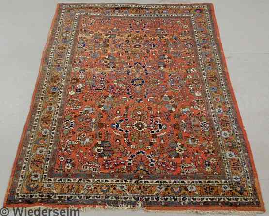 Appraisal: Persian oriental center hall carpet red field and floral patterns