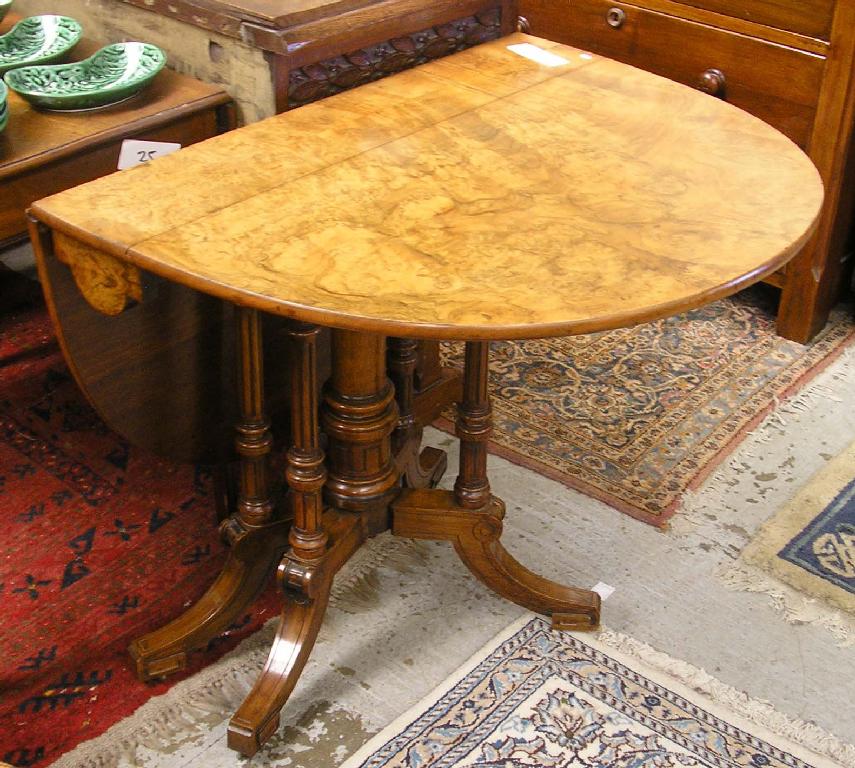 Appraisal: A Victorian figured walnut sutherland table -