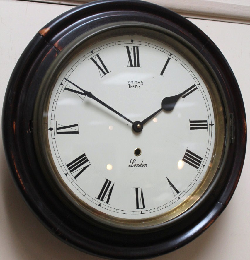 Appraisal: A thC school style clock the cm dia dial with