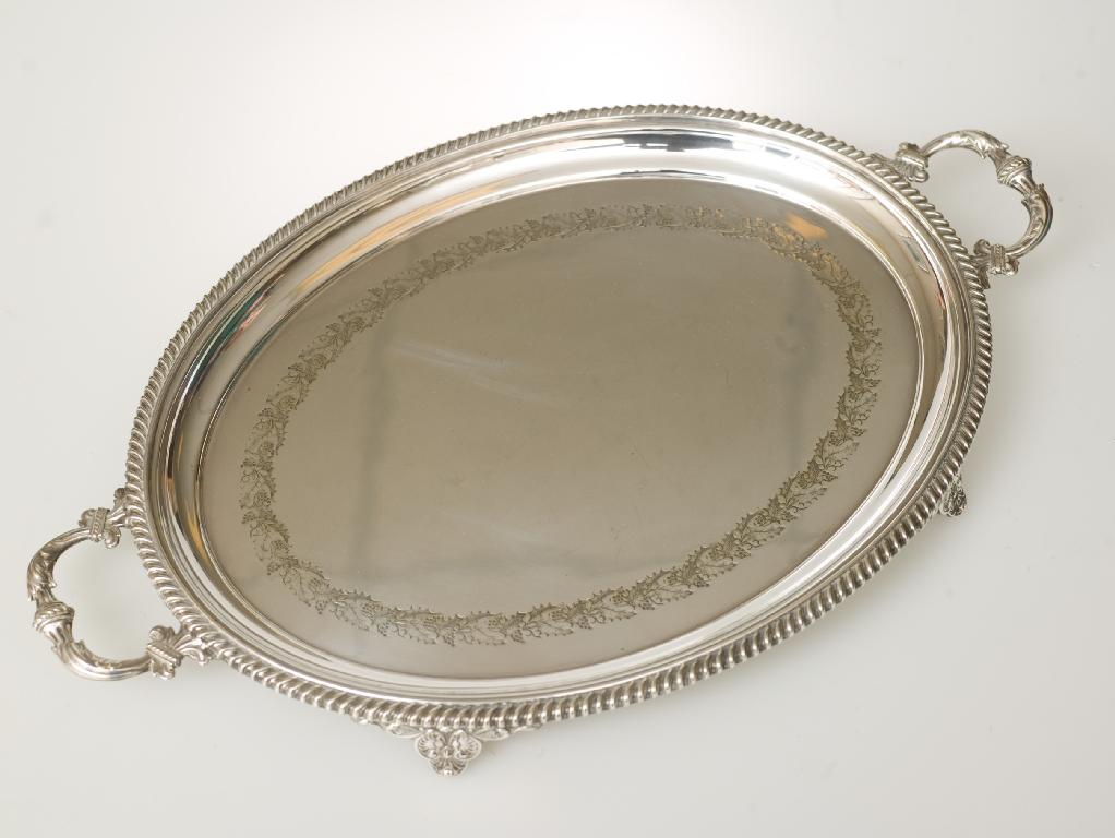 Appraisal: LATE th CENTURY SILVER-PLATED TWO-HANDLED TRAY of oval form with