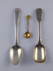 Appraisal: A Georgian silver dessert spoon John Lambe London and a