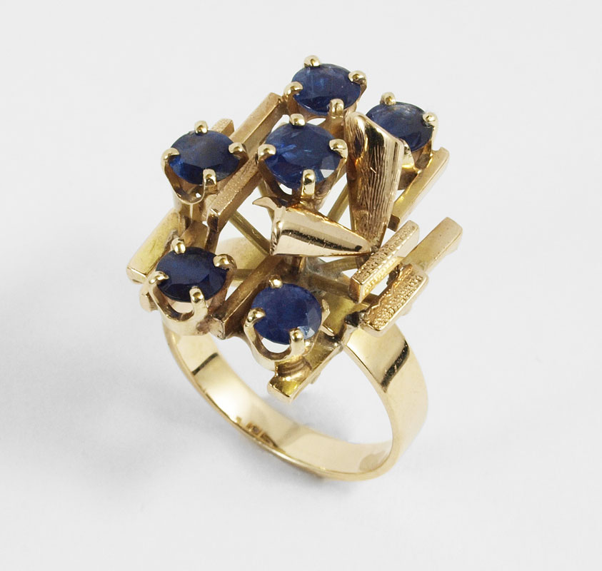 Appraisal: K SAPPHIRE RING K yellow gold ring contains round mixed