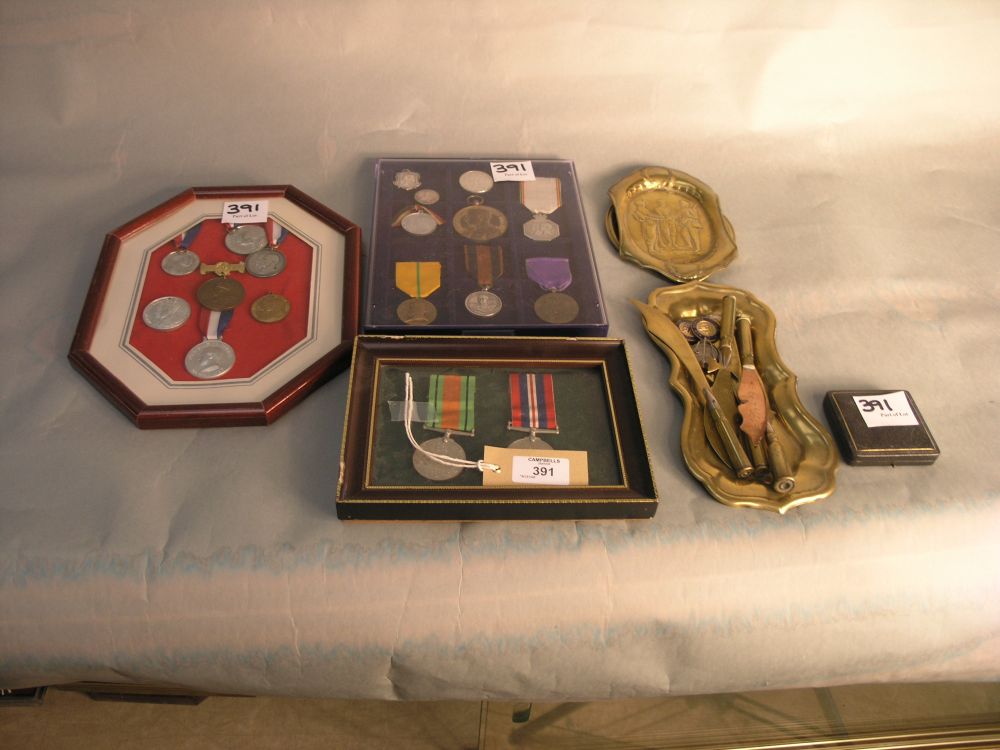 Appraisal: Two World War II medals a frame containing seven commemorative