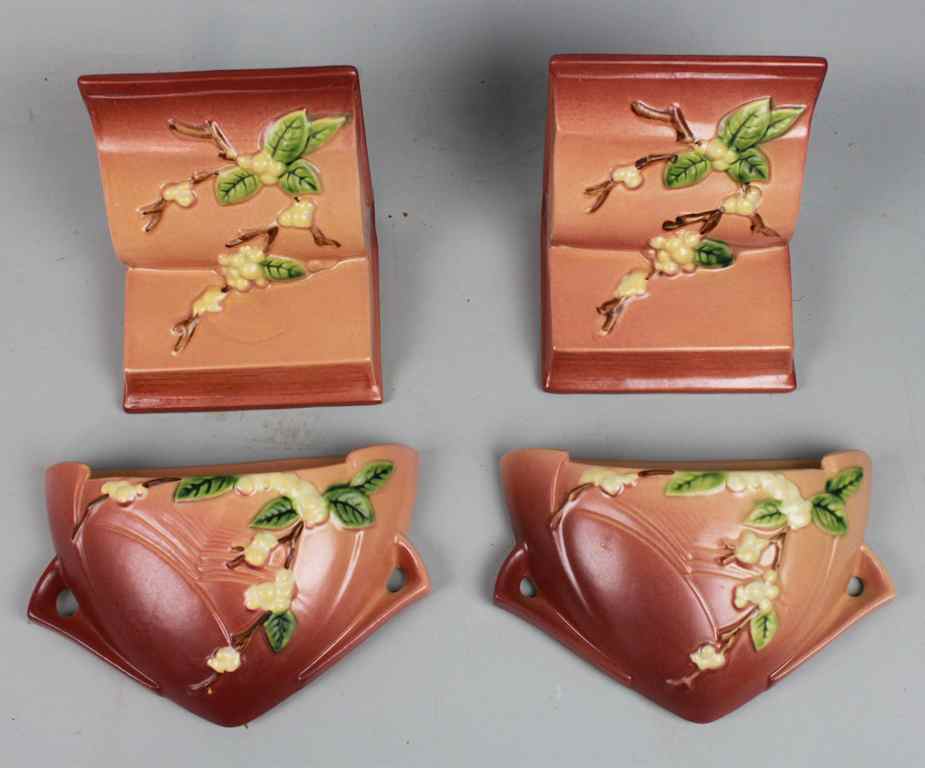 Appraisal: PAIR ROSEVILLE POTTERY PINK SNOWBERRY WALL POCKET VASES flattened triangular