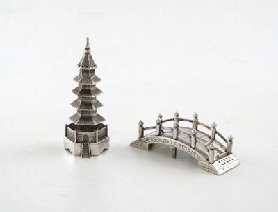 Appraisal: A Japanese novelty silver pepper pot modelled as a bridge