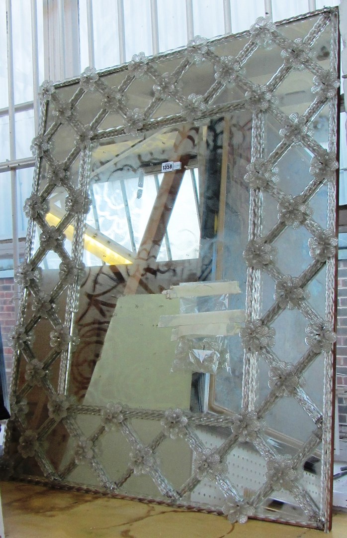 Appraisal: A th century Venetian glass wall mirror with lattice decoration