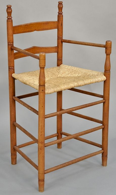 Appraisal: Primitive two slat tall chair with woven seat on turned