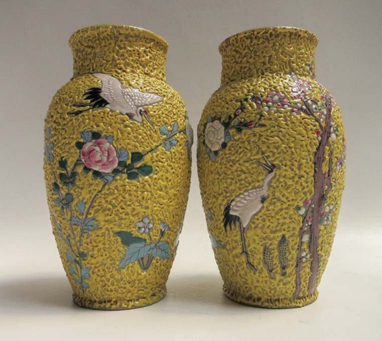 Appraisal: TWO CHINESE EARTHENWARE VASES of baluster form decorated with enamel