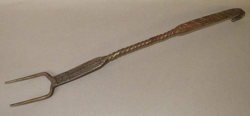 Appraisal: PRIMITIVE TOOL DECORATED HAND WROUGHT FORKca early-mid th century hand