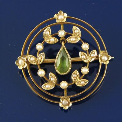 Appraisal: An Edwardian seed pearl set gold circular brooch With pear