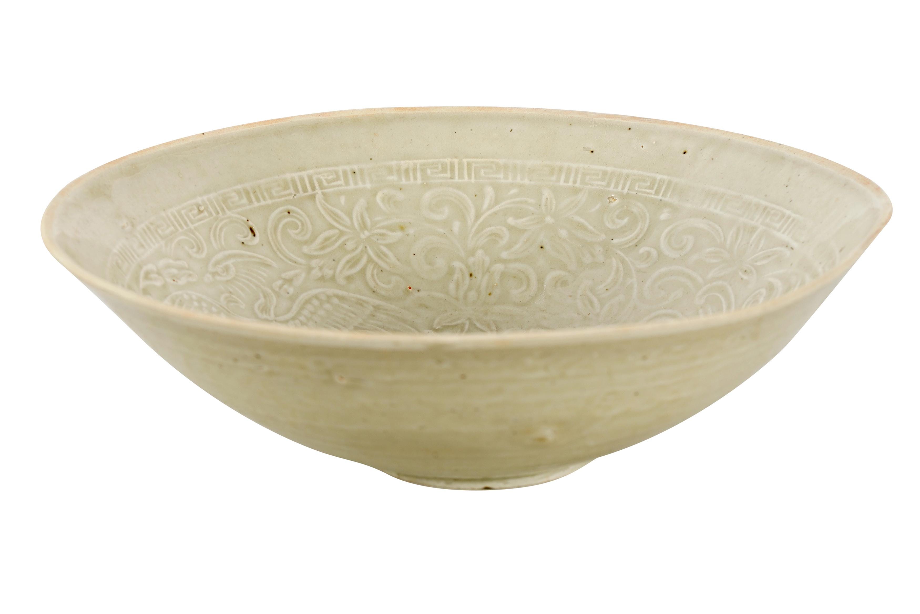 Appraisal: CHINESE GLAZED CERAMIC SHALLOW BOWL unmarked relief-decorated to interior Condition