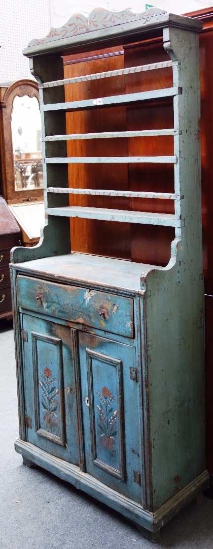 Appraisal: A th century pine painted European dresser the three tier