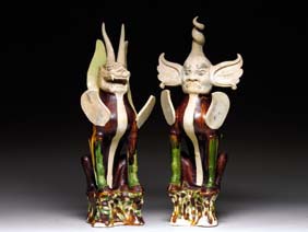 Appraisal: PAIR TANG GLAZED EARTH SPIRITS Pair Chinese Tang Dynasty sancai