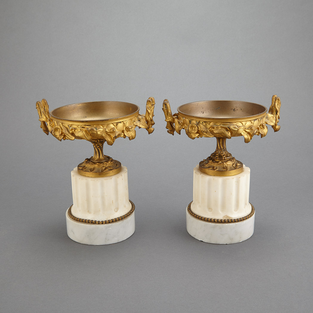 Appraisal: Pair of Neoclassical Style Gilt-Bronze and White Marble Garniture Urns